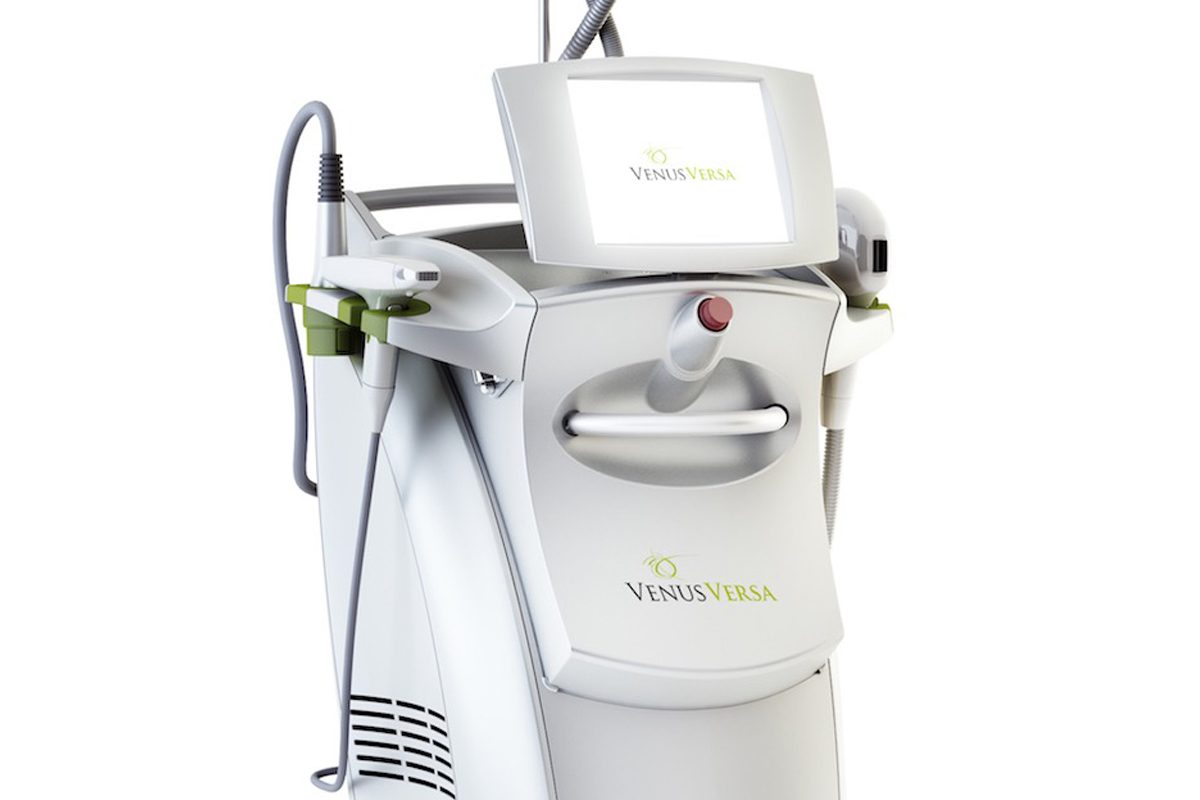 pretty young girl lying on a massage bed at a spa salon